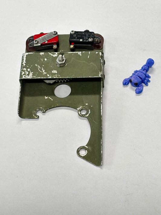 0310324-3 BRACKET ASSY, LIMIT SWITCHS FLAP MOTOR (USED)