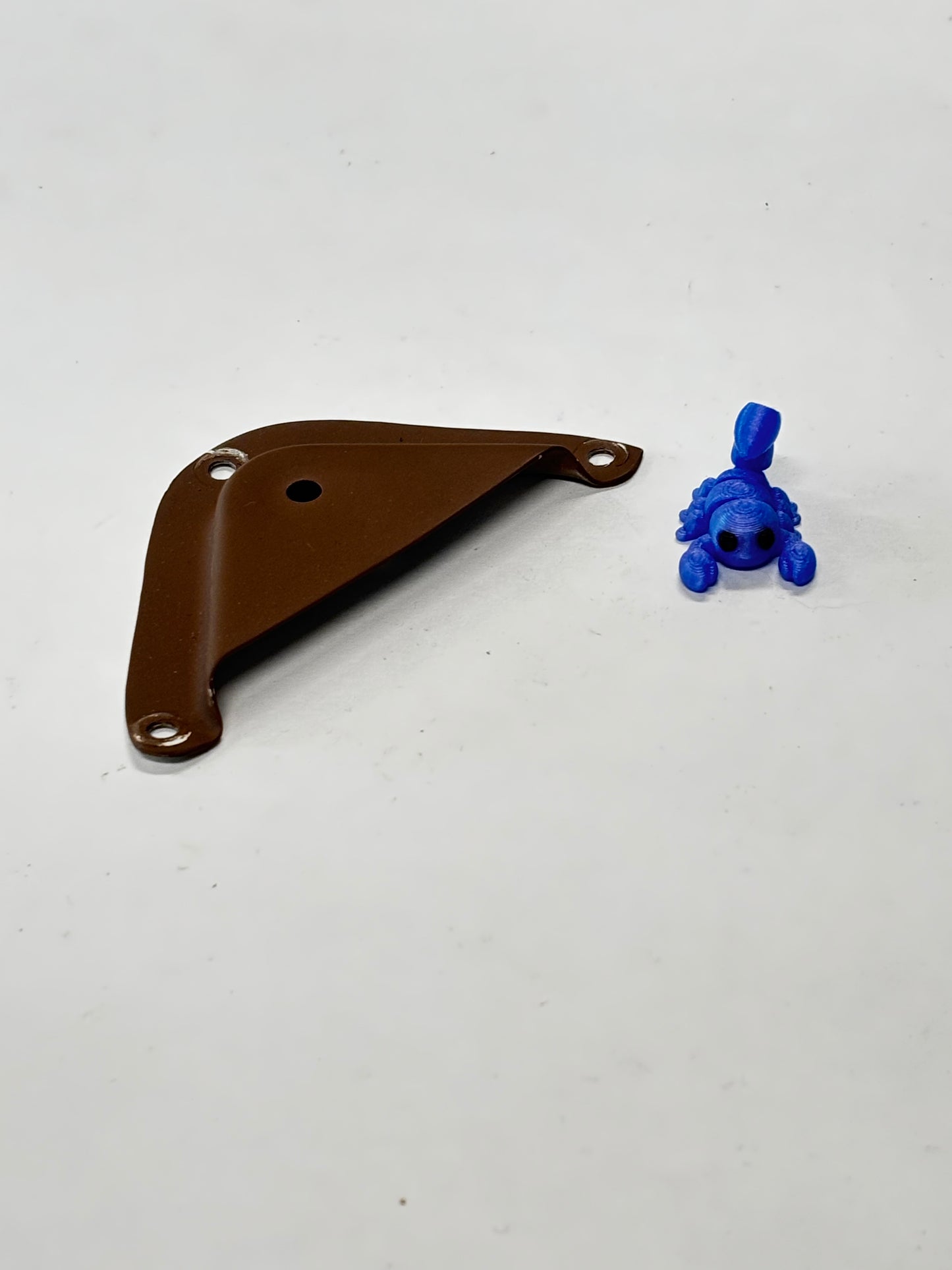 0311711 Bracket, Seatbelt Cover Plate (Used)